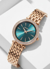 Michael Kors Darci women's rose gold watch with emerald green sunray dial and crystal bezel