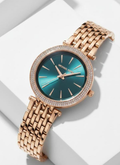 Michael Kors Darci women's rose gold watch with emerald green sunray dial and crystal bezel