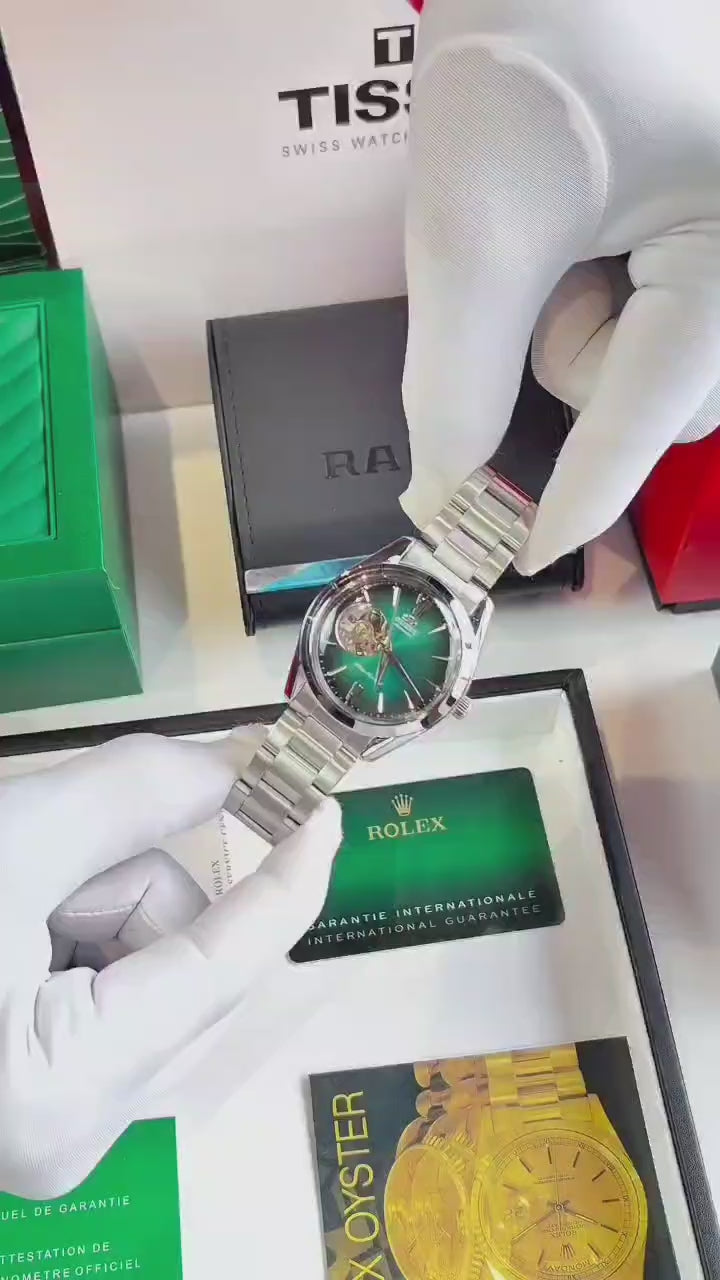 Orient Bambino Open Heart Silver Green shade